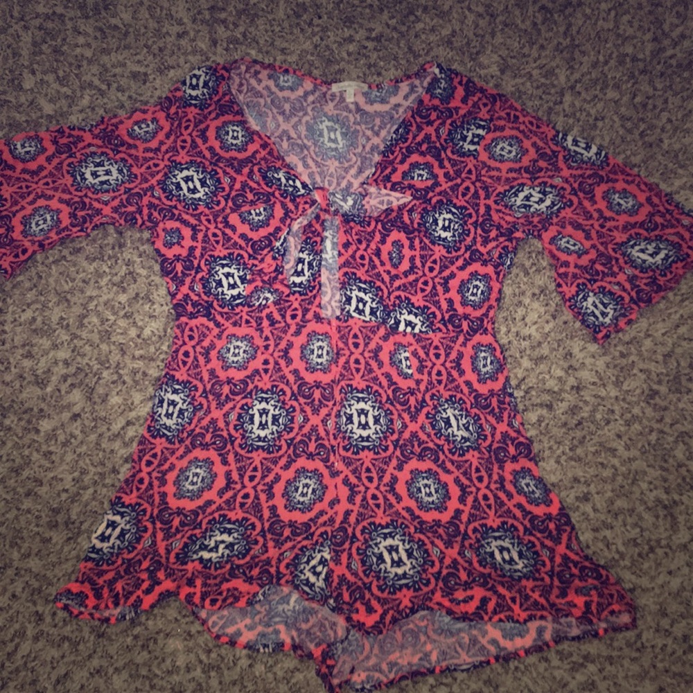 Romper. Never worn.